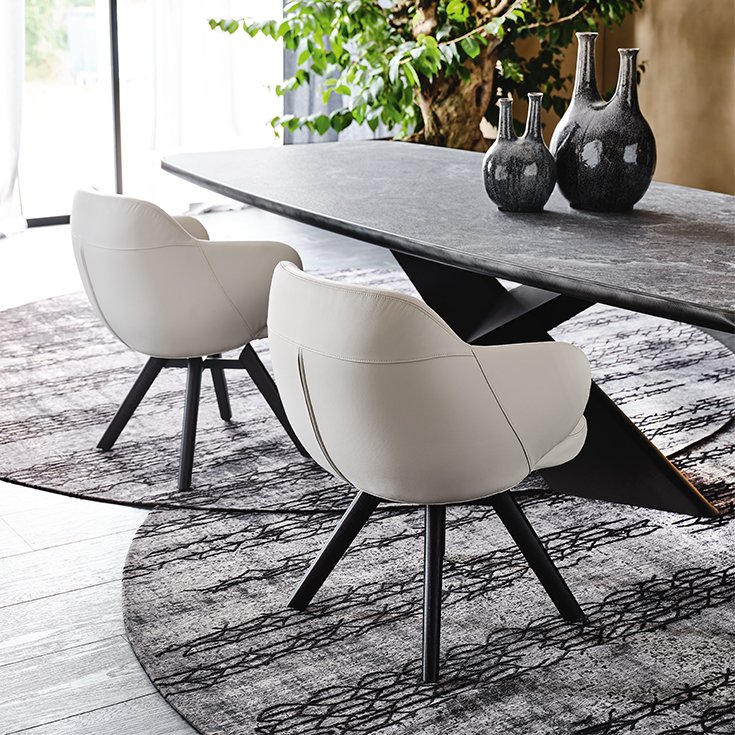 Bombè Chaise design de Cattelan Italia : design enveloppant, pieds bois et assise pivotante au confort raffiné. Disponible chez D-Style Interior.