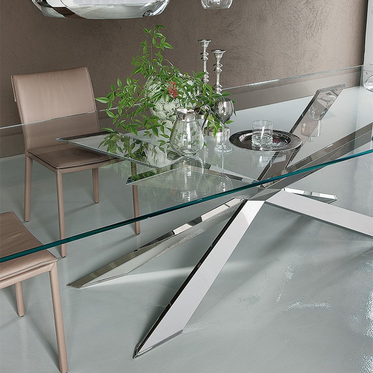 Spyder table design en verre avec base en bois sculpté signée Cattelan Italia, un équilibre parfait entre légèreté et élégance. Disponible chez D-Style Interior.