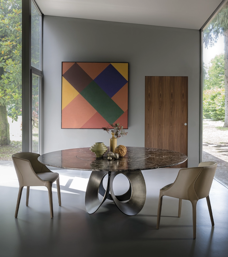 Table à manger design haut de gamme Oracle par Arketipo, base trois cercles métalliques avec plateau marbre, disponible chez D-Style Interior