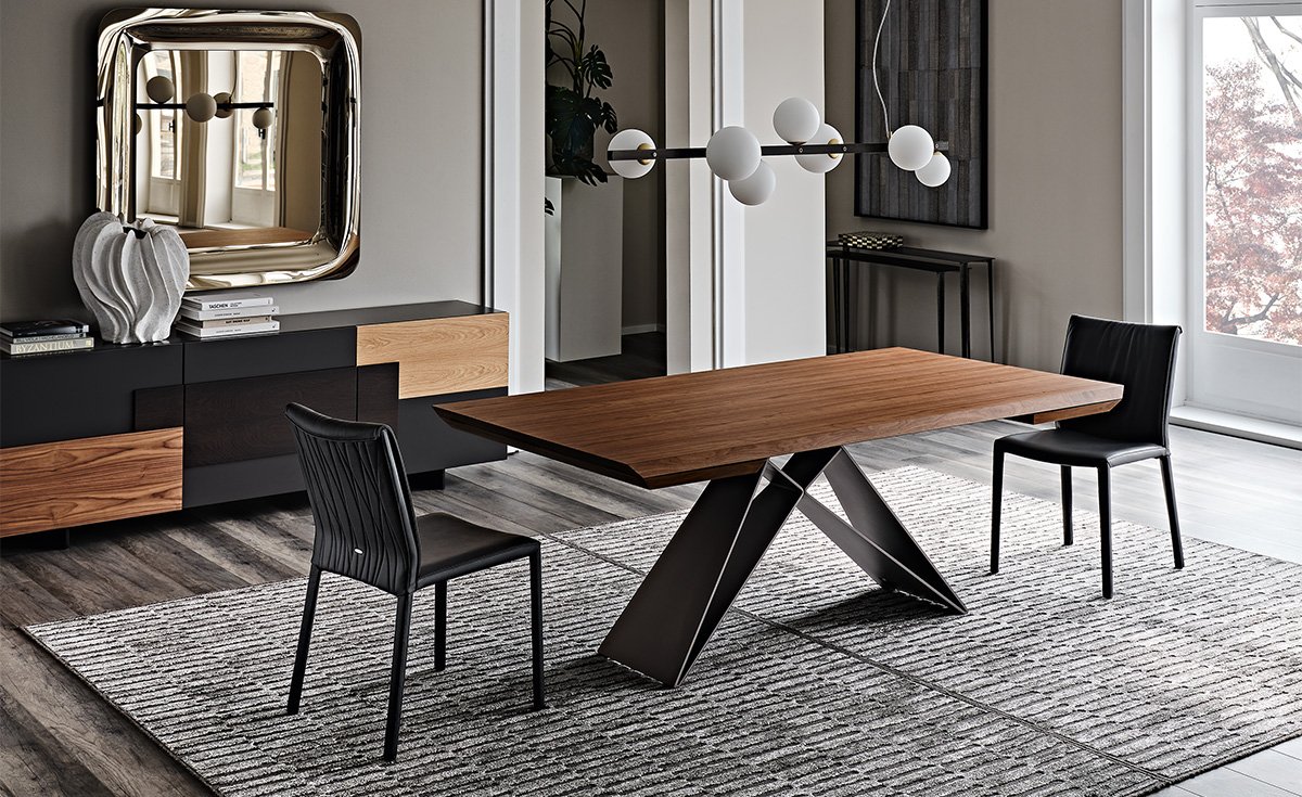 Premier Wood Drive table extensible en bois et acier laqué signée Cattelan Italia, alliant élégance naturelle, innovation et design contemporain. Disponible chez D-Style Interior.