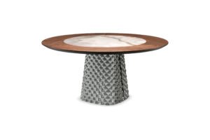 Toggle navigation ATRIUM Ker-Wood Round Home | products | tables Overview Gallery Technical Details Family Finishes Videos Recommended Products ATRIUM Ker-Wood Round Gallery Home | products | tables ATRIUM Ker-Wood Round Year: 2022 The Atrium family of tables comes in numerous versions to meet the most varied aesthetic needs and optimally furnish a modern dining room. The central base consists of two finely worked plates of couture mirrored glass. The table creates a play of soft reflections, in which the surrounding objects and light sources reverberate. The glass is shaped with an unprecedented technique that gives the surface a three-dimensional effect like quilting on fabric. The table tops of the Atrium line range from wood to ceramics up to round tables in wood and ceramics combined. The numerous attractive versions available are: Atrium Keramik, Atrium Keramik Premium, Atrium Keramik Round, Atrium Keramik Premium Round, Atrium Ker-Wood Round, Atrium Wood and Atrium Wood Round. The family is completed by the modern consoles Atrium Keramik and Atrium Wood, both fascinating and functional. Note: Atrium base, REGISTERED DESIGN Share: Home | products | tables Explore the unique settings and let yourself be swept away by the precious finishes and the sculptural shapes of the modern furnitures designed by Cattelan Italia 1 Home | products | tables ATRIUM Ker-Wood Round Table with base in mirrored and quilted fumé or bronze curved glass. Top in Canaletto walnut (NC) or burned oak (RB) with insert in ceramic Marmi Alabastro (KM02), matt Golden Calacatta (KM05), glossy Golden Calacatta (KM06), matt Portoro (KM07), glossy Portoro (KM08), glossy Sahara Noir (KM09), Makalu (KM11), Breccia (KM12), matt Borghini Calacatta (KM18), Colosseo (KM21), Andromeda (KM22), matt Invisible (KM24) or Luxor (KS23). Black chrome (06) details. "T" version with swiveling ceramic insert. Technical Drawings Dimensions ø160x74,5h 7 ø160x74,5h - T 7 ø180x74,5h 8 ø180x74,5h - T 8 Product Sheet Product Sheet ATRIUM Ker-Wood Round Packaging materials The packaging of this product consists of recyclable non-composite materials.We provide you with information on the materials with which this product is packaged, to help you sort them in the separate waste collection, so that they are actually used to produce secondary raw material. Wood High-density polyethylene Low-density polyethylene Corrugated fibreboard The capitonnè workmanship with a three-dimensional effect makes the Atrium family of tables and consoles inimitable Atrium Keramik Year: 2022 Console with base in mirrored and quilted fumé or bronze curved glass. Top in ceramic Marmi Alabastro (KM02), matt Golden Calacatta (KM05), glossy Golden Calacatta (KM06), matt Portoro (KM07), glossy Portoro (KM08), glossy Sahara Noir (KM09), Makalu (KM11), Breccia (KM12), Corcovado (KM14), Kaindy (KM16), Borghini Calacatta opaco (KM18), Borghini Calacatta lucido (KM19), Colosseo (KM21), Andromeda (KM22), matt Invisible (KM24) or Luxor (KS23). Wall anchorage is necessary. continue Atrium Wood Year: 2025 Console with base in mirrored and quilted fumé or bronze curved glass. Top in Canaletto walnut (NC) with details in burned oak or burned oak (RB) with details in Canaletto walnut. Wall anchorage is necessary. continue Atrium Keramik Year: 2022 Table with base in mirrored and quilted fumé or bronze curved glass. Top in ceramic Marmi Alabastro (KM02), matt Golden Calacatta (KM05), glossy Golden Calacatta (KM06), matt Portoro (KM07), glossy Portoro (KM08), glossy Sahara Noir (KM09), Makalu (KM11), Breccia (KM12), Corcovado (KM14), Kaindy (KM16), matt Borghini Calacatta (KM18), glossy Borghini Calacatta (KM19), Colosseo (KM21), Andromeda (KM22), matt Invisible (KM24) or Luxor (KS23). The top is laid on the base. continue Atrium Keramik Premium Year: 2022 Table with base in mirrored and quilted fumé or bronze curved glass. Top in ceramic Marmi Alabastro (KM02), matt Golden Calacatta (KM05), glossy Golden Calacatta (KM06), matt Portoro (KM07), glossy Portoro (KM08), glossy Sahara Noir (KM09), Makalu (KM11), Breccia (KM12), Borghini Calacatta opaco (KM18), Borghini Calacatta lucido (KM19), Colosseo (KM21), Andromeda (KM22), matt Invisible (KM24) or Luxor (KS23) with Brushed Bronze or Brushed Grey lacquered and rounded lower profile. Colour and brushing variations of the Brushed finish are characteristics of the handcrafted processing and should not be considered as defects. continue Atrium Keramik Premium Round Year: 2022 Table with base in mirrored and quilted fumé or bronze curved glass. Top in ceramic Marmi Alabastro (KM02), matt Golden Calacatta (KM05), glossy Golden Calacatta (KM06), matt Portoro (KM07), glossy Portoro (KM08), glossy Sahara Noir (KM09), Makalu (KM11), Breccia (KM12), Borghini Calacatta opaco (KM18), Colosseo (KM21), Andromeda (KM22), matt Invisible (KM24) or Luxor (KS23) with Brushed Bronze or Brushed Grey lacquered and rounded lower profile. Colour and brushing variations of the Brushed finish are characteristics of the handcrafted processing and should not be considered as defects. continue Atrium Keramik Round Year: 2022 Table with base in mirrored and quilted fumé or bronze curved glass. Top in ceramic Marmi in Alabastro (KM02), matt Golden Calacatta (KM05), glossy Golden Calacatta (KM06), matt Portoro (KM07), glossy Portoro (KM08), glossy Sahara Noir (KM09), Makalu (KM11), Breccia (KM12), Borghini Calacatta opaco (KM18) Colosseo (KM21), Andromeda (KM22), matt Invisible (KM24) or Luxor (KS23). Optional central swiveling tray Lazy Susan. continue Atrium Wood Year: 2022 Table with base in mirrored and quilted fumé or bronze curved glass. Version "B": barrel top with angled edges in Canaletto walnut (NC) or burned oak (RB). "Masterwood" version: boat shaped top in Canaletto walnut (NC) or burned oak (RB) made of diagonal wooden planks of different sizes. Oblique and rounded edges. Colour and brushing variations of the Brushed finish are characteristics of the handcrafted processing and should not be considered as defects. continue Atrium Wood Round Year: 2022 Table with base in mirrored and quilted fumé or bronze curved glass. Top in Canaletto walnut (NC) or burned oak (RB). continue Atrium Keramik Year: 2022 Console with base in mirrored and quilted fumé or bronze curved glass. Top in ceramic Marmi Alabastro (KM02), matt Golden Calacatta (KM05), glossy Golden Calacatta (KM06), matt Portoro (KM07), glossy Portoro (KM08), glossy Sahara Noir (KM09), Makalu (KM11), Breccia (KM12), Corcovado (KM14), Kaindy (KM16), Borghini Calacatta opaco (KM18), Borghini Calacatta lucido (KM19), Colosseo (KM21), Andromeda (KM22), matt Invisible (KM24) or Luxor (KS23). Wall anchorage is necessary. continue Atrium Wood Year: 2025 Console with base in mirrored and quilted fumé or bronze curved glass. Top in Canaletto walnut (NC) with details in burned oak or burned oak (RB) with details in Canaletto walnut. Wall anchorage is necessary. continue Atrium Keramik Year: 2022 Table with base in mirrored and quilted fumé or bronze curved glass. Top in ceramic Marmi Alabastro (KM02), matt Golden Calacatta (KM05), glossy Golden Calacatta (KM06), matt Portoro (KM07), glossy Portoro (KM08), glossy Sahara Noir (KM09), Makalu (KM11), Breccia (KM12), Corcovado (KM14), Kaindy (KM16), matt Borghini Calacatta (KM18), glossy Borghini Calacatta (KM19), Colosseo (KM21), Andromeda (KM22), matt Invisible (KM24) or Luxor (KS23). The top is laid on the base. continue Atrium Keramik Premium Year: 2022 Table with base in mirrored and quilted fumé or bronze curved glass. Top in ceramic Marmi Alabastro (KM02), matt Golden Calacatta (KM05), glossy Golden Calacatta (KM06), matt Portoro (KM07), glossy Portoro (KM08), glossy Sahara Noir (KM09), Makalu (KM11), Breccia (KM12), Borghini Calacatta opaco (KM18), Borghini Calacatta lucido (KM19), Colosseo (KM21), Andromeda (KM22), matt Invisible (KM24) or Luxor (KS23) with Brushed Bronze or Brushed Grey lacquered and rounded lower profile. Colour and brushing variations of the Brushed finish are characteristics of the handcrafted processing and should not be considered as defects. continue PreviousNext Home | products | tables Finiture Explore the finishes and customize your favourite design pieces Base Insert Top bronze mirrored quilted KS23 Luxor NC walnut canaletto BaseInsertTop Glass BRONZE Mirrored quilted FUMÉ Mirrored quilted The 2022 collection of Cattelan Italia tables meet numerous needs. They range from sculptural to minimal forms, from natural materials to the most modern ones Explore the products that complement the collection which boasts of an authentic and sophisticated design, they are conceived to become functional and comfortable life partners. Your rooms deserve to be customized according to your unique style. You might be interested in Biarritz Biarritz came from an idea by Oriano Favaretto, a modern ceiling lamp that recalls the compositions of shapes and materials from the avant-garde metaphysical current. Like satellites, lampshades of different sizes and colours gravitate around the steel circumference, illuminated internally by LED lights. Other elements are animated by light, such as the opaque glass sphere and the ribbed stem. The apparently random composition is the result of a precise study of weights and volumes to find the perfect balance for this modern lamp that gives the room a sophisticated, high-end allure. continue Coimbra The Coimbra suspended glass lamp consists of a transparent sphere, flattened in the centre, which houses a painted glass bell inside. Everything about this design lamp, from its soft curves to the combination of complementary, transparent and reflective finishes, contributes to decorating a space with harmony and lightness, even when the light is off. Coimbra is suitable for lighting a dining room, with an asymmetrical composition on multiple heights, descending gently at a side table next to a sofa, or lighting a comfortable reading corner. continue Soho Ker-wood The round tables of the Soho family are iconic and sculptured, a real piece of architecture in the living room. Key items in the room, this modern table places form at the service of function and adapts perfectly to the quality of the raw materials, for a spectacular result. In the Soho Keramik version, the graphic and essential steel base supports a top in refined shades of Marmi ceramic. The Soho Ker-Wood model, on the other hand, is created from an unprecedented combination of precious woods and the original ceramic insert. continue Camilla A design with sinuous lines that envelop the body, support posture and help make modern dining rooms cosy environments you can feel at home in. The Camilla family of armchairs and stools is the perfect example of a chair with upholstered arms that complements a room with the subtlety and sensuality you wish for in a home environment. The horizontal stitching on the back part of the backrest results in 3 upholstered projections that finish evenly and seamlessly in the armrest. In the lower part of the backrest, the deep frame and leg joints further accentuate the softness of the enveloping curves. This designer armchair comes in two variants: Camilla, with legs in fine wood, and Camilla ML, with metal legs, making it lighter and more manoeuvrable. Both variants strike the perfect balance between a spacious seat and graceful legs. To complete your room consistently, you can combine them with the Camilla Sgabello modern kitchen stools. As with other customisable seating families, the metal frame is available in different heights and shape variations, with shades to match the elegant leathers and fabrics in the sample collection. The family is rounded off by the modern swivel armchair, Camilla Lounge, whose wide, rounded seat and metal base streamline its ample silhouette. This armchair is also available in a fixed version, with four metal legs. continue Rhonda The rounded shapes in the Rhonda family of armchairs and stools exude a natural elegance that makes them ideal for furnishing comfortable and welcoming designer dining rooms. The soft folds that decorate the inside of the backrest contrast with the stretched frame that wraps around the body. This dining chair with armrests is available in several variants. The Rhonda model with metal legs is lighter and more manoeuvrable than the Rhonda Wood version, which features legs made of attractive, high-quality wood. The Rhonda Cantilever model, on the other hand, features the typical cantilever frame design, made up of a single steel bar, found in the cantilever chair line. A more functional or office-friendly option is the Rhonda Turn version of this designer swivel chair, made with a four-spoke base. To complete your room consistently, you can combine them with the designer counter stools: Rhonda Sgabello. As with other customisable seating families, the metal frame is available in different heights and shape variations, with shades to match the elegant leathers and fabrics in the sample collection. The family is rounded off by the modern swivel armchair, Rhonda Lounge, whose wide, rounded seat and swivel base streamline its ample silhouette. On the lower part of the backrest on each model, the deep frame and leg joints further accentuate the gentle curves of these elegant modern chairs. The Rhonda family provides the perfect combination of both elegance and practicality, and expressiveness and discretion. continue Blues To furnish an environment that conveys tranquillity and balance, but at the same time is a place to regenerate and find new stimuli, the secret is to choose fluid shapes with intriguing decorative details that blend delicately with the design. The Blues design sideboard designed by Giorgio Cattelan and Andrea Lucatello bases its raison d’être precisely on this aesthetic concept. Perfectly symmetrical, it is characterised by a rounded shape with a recess in the centre. Its external doors, when opened, unfold like the wings of a seagull, revealing the interior enriched by fine glass tops. The lack of excess in the finishes is balanced by the unique shape, while the mirrored top embellishes this modern lacquered wood sideboard and makes it worthy of a sophisticated design living room. continue Kimi The Cattelan Italia collection of modern rugs is designed to complement a welcoming home, as well as contract interior design projects. Our designer rugs are made with fibres that are pleasantly soft to the touch. These modern carpets harmoniously match with the surrounding interior design, thanks to the geometric decorative patterns with a slight relief and the soft and bright chromatic contrasts. A range of different sizes of modern rectangular rugs is available, as well as some round rug models. For proper maintenance of your precious Cattelan Italia rug, professional dry cleaning is recommended. continue Akumal With the Akumal model, Paolo Cattelan perfectly combines function and decorative appearance. The vertical shape of this modern mirror can comfortably reflect the human figure, but its refined elegance is what immediately catches the eye. This mirror is full of irregular sinuous curves that embrace the room. It is composed on two levels: the upper one is mirrored while the lower one is smoked transparent. When equipped with LED light, facing the wall as a light frame, the decorative function of this design mirror increases further. continue Biarritz Biarritz came from an idea by Oriano Favaretto, a modern ceiling lamp that recalls the compositions of shapes and materials from the avant-garde metaphysical current. Like satellites, lampshades of different sizes and colours gravitate around the steel circumference, illuminated internally by LED lights. Other elements are animated by light, such as the opaque glass sphere and the ribbed stem. The apparently random composition is the result of a precise study of weights and volumes to find the perfect balance for this modern lamp that gives the room a sophisticated, high-end allure. continue Coimbra The Coimbra suspended glass lamp consists of a transparent sphere, flattened in the centre, which houses a painted glass bell inside. Everything about this design lamp, from its soft curves to the combination of complementary, transparent and reflective finishes, contributes to decorating a space with harmony and lightness, even when the light is off. Coimbra is suitable for lighting a dining room, with an asymmetrical composition on multiple heights, descending gently at a side table next to a sofa, or lighting a comfortable reading corner. continue Soho Ker-wood The round tables of the Soho family are iconic and sculptured, a real piece of architecture in the living room. Key items in the room, this modern table places form at the service of function and adapts perfectly to the quality of the raw materials, for a spectacular result. In the Soho Keramik version, the graphic and essential steel base supports a top in refined shades of Marmi ceramic. The Soho Ker-Wood model, on the other hand, is created from an unprecedented combination of precious woods and the original ceramic insert. continue Camilla A design with sinuous lines that envelop the body, support posture and help make modern dining rooms cosy environments you can feel at home in. The Camilla family of armchairs and stools is the perfect example of a chair with upholstered arms that complements a room with the subtlety and sensuality you wish for in a home environment. The horizontal stitching on the back part of the backrest results in 3 upholstered projections that finish evenly and seamlessly in the armrest. In the lower part of the backrest, the deep frame and leg joints further accentuate the softness of the enveloping curves. This designer armchair comes in two variants: Camilla, with legs in fine wood, and Camilla ML, with metal legs, making it lighter and more manoeuvrable. Both variants strike the perfect balance between a spacious seat and graceful legs. To complete your room consistently, you can combine them with the Camilla Sgabello modern kitchen stools. As with other customisable seating families, the metal frame is available in different heights and shape variations, with shades to match the elegant leathers and fabrics in the sample collection. The family is rounded off by the modern swivel armchair, Camilla Lounge, whose wide, rounded seat and metal base streamline its ample silhouette. This armchair is also available in a fixed version, with four metal legs. continue PreviousNext Cattelan Italia spa - P.iva 00872290242 - T. +39 0445 318711 - F. +39 0445 314289 Follow us To have more information on Cattelan Italia products, write directly to : info@cattelanitalia.com IT - PrivacyNewsDealers – store locatorB2BCattelan Italia ConnectCOOKIES POLICYWhistleblowingCompany InformationCredits This website uses cookies to improve users' browsing experience and gather information on their use of the website. We use both technical and third-party cookies to send promotional messages based on user behaviour. Further information can be found in our privacy policy. SettingsACCEPT ALL