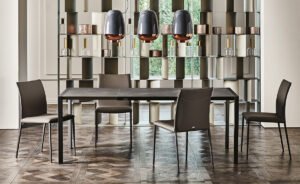 Pedro Drive table extensible design haut de gamme en acier laqué et bois laminé, alliant élégance italienne et fonctionnalité contemporaine. Disponible chez D-Style Interior.
