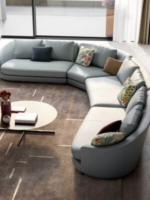 Canapé design haut de gamme DUO par Poltrona Frau, design courbe modulaire gainé cuir Pelle Frau®, disponible chez D-Style Interior