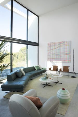Canapé design haut de gamme Kennedee par Poltrona Frau, système modulable avec matelassage main motif X, disponible chez D-Style Interior
