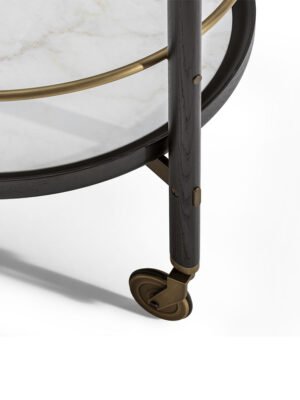 Bibliothèque mobile design haut de gamme DUO Trolley par Poltrona Frau, structure frêne massif avec plateaux verre et marbre, détails laiton bronzé et roulettes