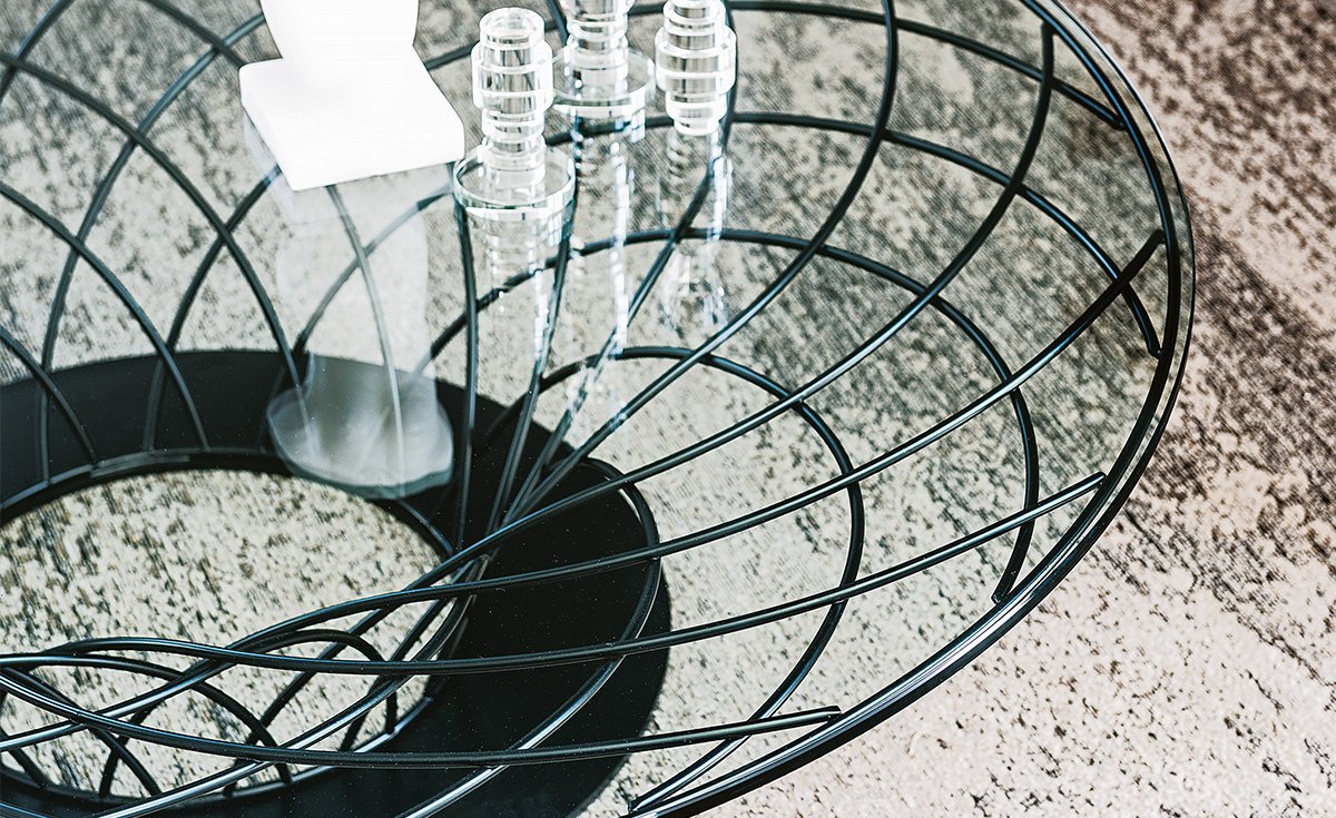 Table basse design haut de gamme Nido par Cattelan Italia, base acier laqué et plateau verre ou acier, disponible chez D-Style Interior.