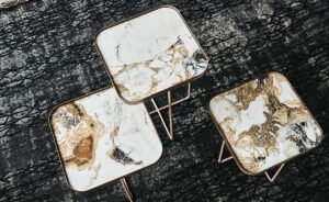 Table basse design haut de gamme Benny Keramik par Cattelan Italia, plateau céramique Marmi carré avec pieds en X, disponible chez D-Style Interior.