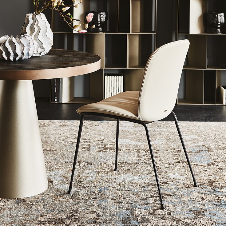 Tina Chaise design de Cattelan Italia : structure en acier laqué, assise confortable et ligne élégante, parfaite pour un intérieur contemporain. Disponible chez D-Style Interior.