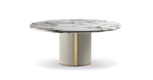 Corsini table design haut de gamme par Vittoria Frigerio, avec base en cuir matelassé et plateau marbre ou bois selon la version. Disponible chez D-Style Interior.