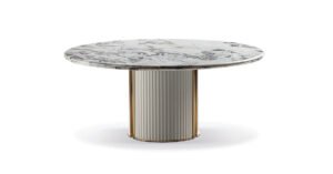 Corsini table design haut de gamme par Vittoria Frigerio, avec base en cuir matelassé et plateau marbre ou bois selon la version. Disponible chez D-Style Interior.