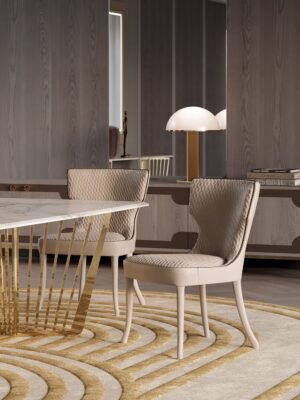 Adda chaise design haut de gamme par Vittoria Frigerio, aux lignes élégantes et au dossier enveloppant, avec matelassage raffiné et pieds en frêne massif. Disponible chez D-Style Interior.