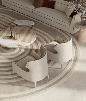 Piola Bergère fauteuil design haut de gamme par Vittoria Frigerio avec dossier aux ailes enveloppantes et capitonnage raffiné. Disponible chez D-Style Interior.