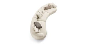 Monaco canapé design haut de gamme par Vittoria Frigerio, aux formes douces et modulables, avec base en cuir et finitions raffinées. Disponible chez D-Style Interior.