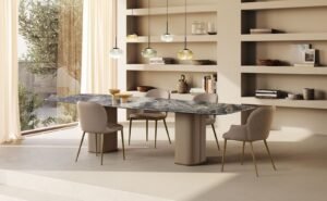 Milos table à manger de Gamma Arredamenti associe cuir, bois courbé et plateau en marbre, verre ou céramique. Élégance italienne disponible chez D-Style Interior.
